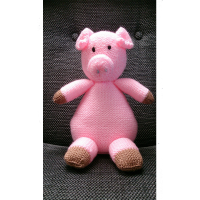 Hand knitted farm animal toy